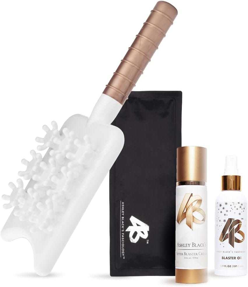 Anti-cellulite kit with massage tool, blaster oil, and cleanser bottle on display.